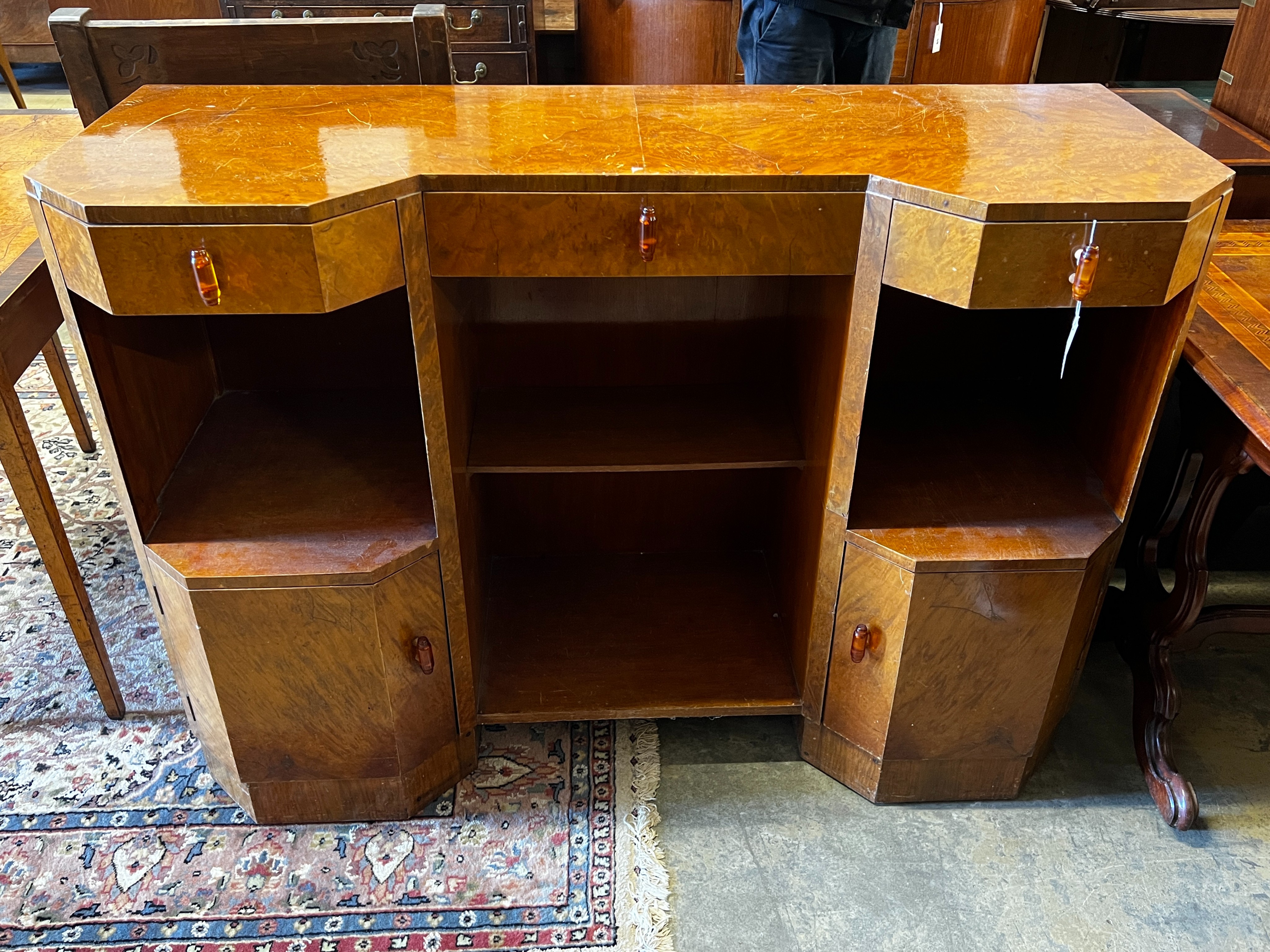 A French Art Deco bird's eye maple side cabinet, width 137cm, depth 51cm, height 97cm